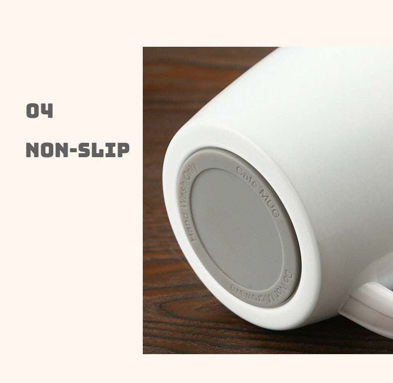 White mug with a non-slip feature on a wooden surface